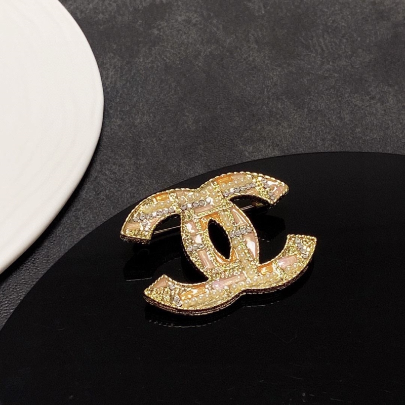 Ch**el brooches